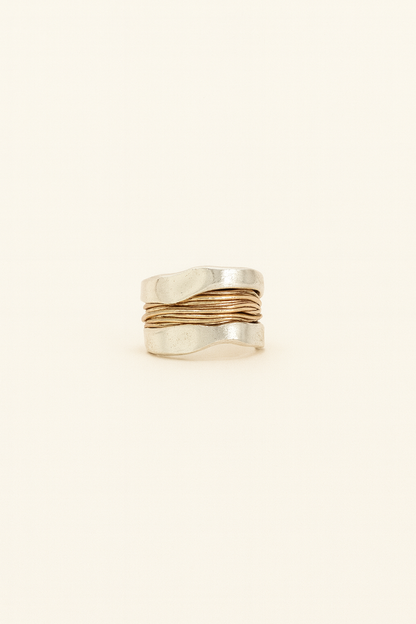 Silver ring with golden threads