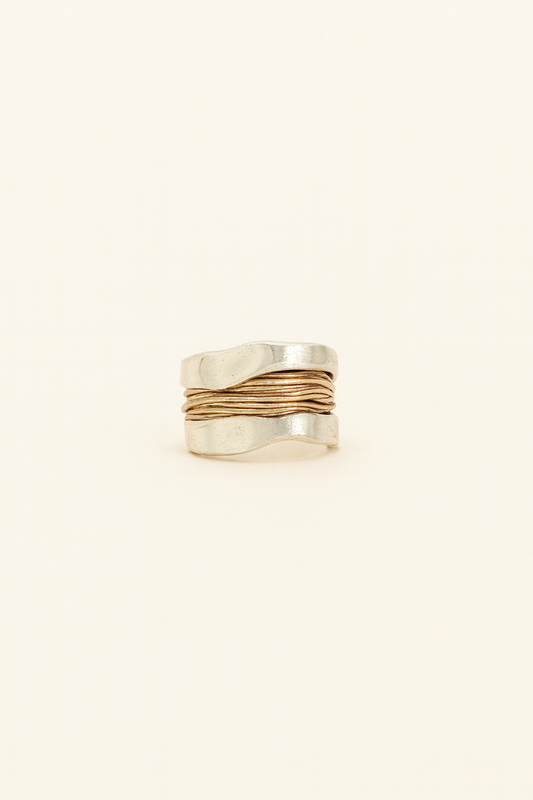 Silver ring with golden threads