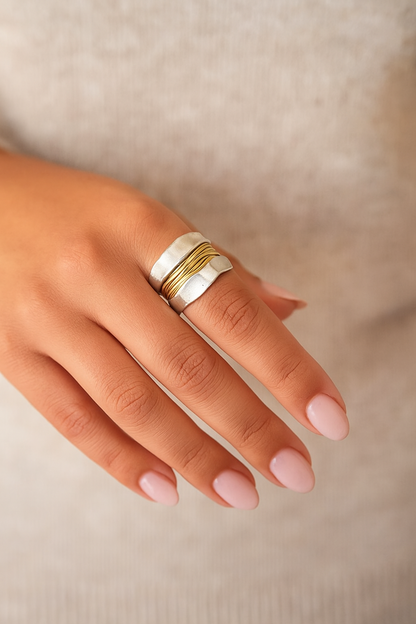 Silver ring with golden threads