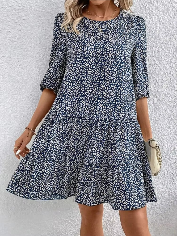 Blue casual summer dress with floral print, lightweight and comfortable dress for sunny days and outdoor occasions.