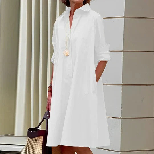 Elegant blouse dress with collar, perfect for both professional and chic casual occasions.