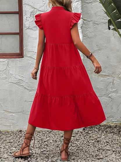 Elegant summer dress with ruffled sleeves, ideal for warm weather and stylish events.