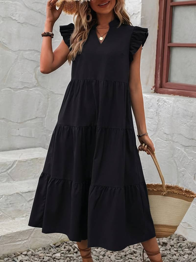 Elegant summer dress with ruffled sleeves, ideal for warm weather and stylish events.