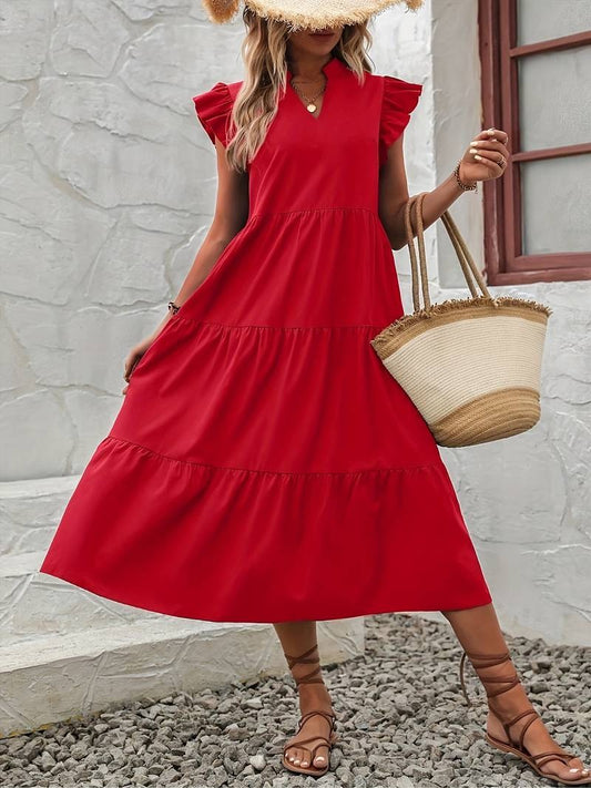 Elegant summer dress with ruffled sleeves, ideal for warm weather and stylish events.